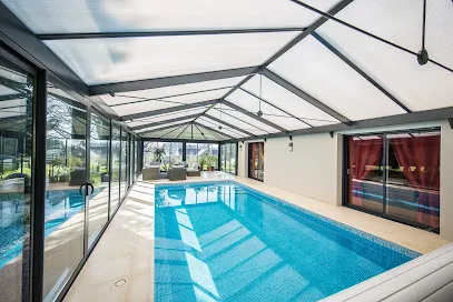 Image de AKENA véranda, extension de maison, pergola bioclimatique, carport et pool house Toulouse